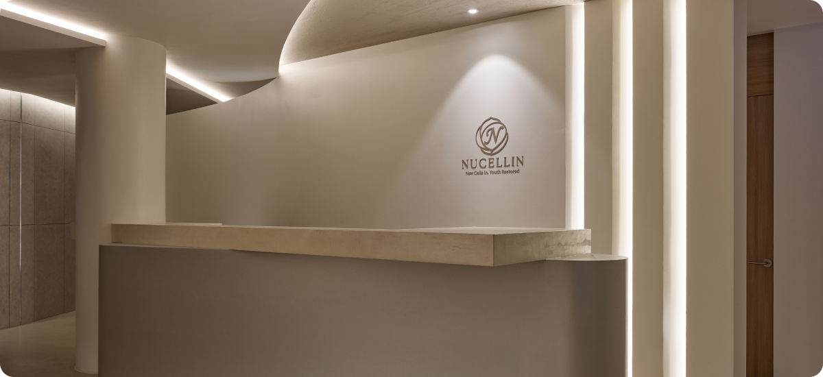 Reception counter with brand signage at Nucellin Orthopedic Clinic in Seoul